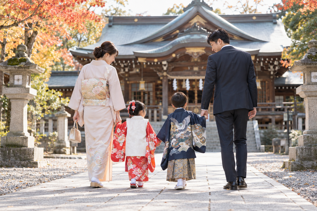 七五三で晴れ着姿の子どもと家族が神社を参拝するイメージ